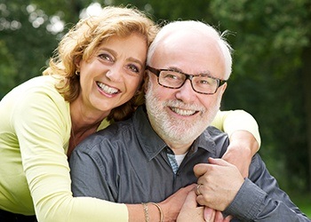 Smiling senior man and woman