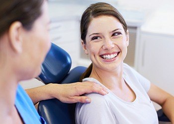 Smiling woman in dental chair