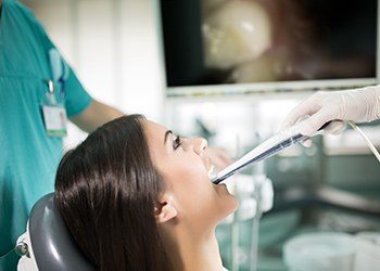 Woman receiving intraoral photos