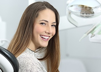 Woman smiling in the dental chair